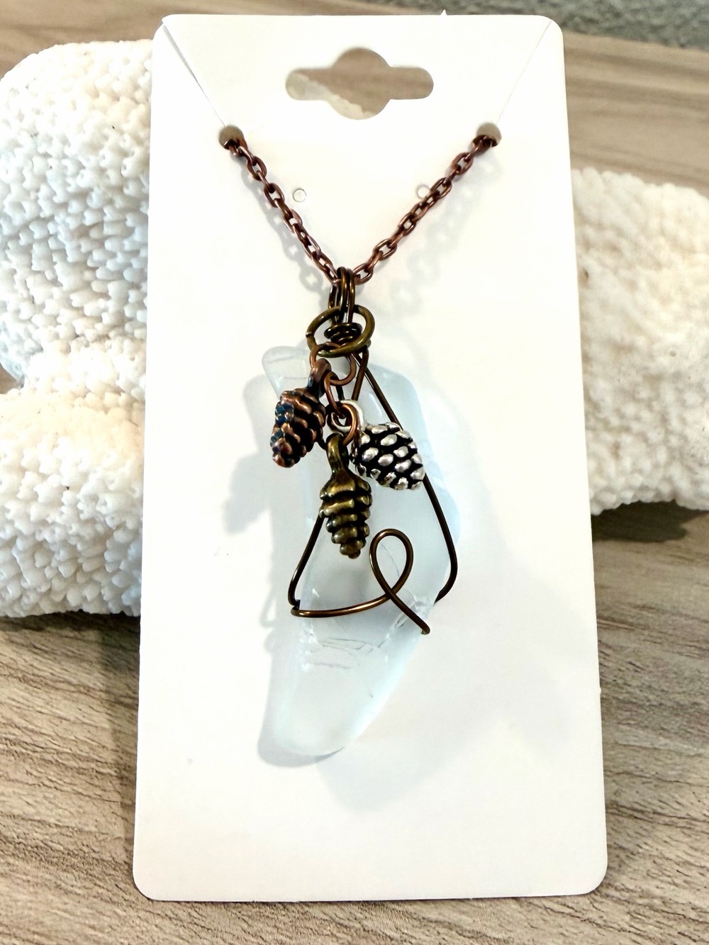 138. Clear Sea Glass Pendant Necklace with Copper Pinecone Charms